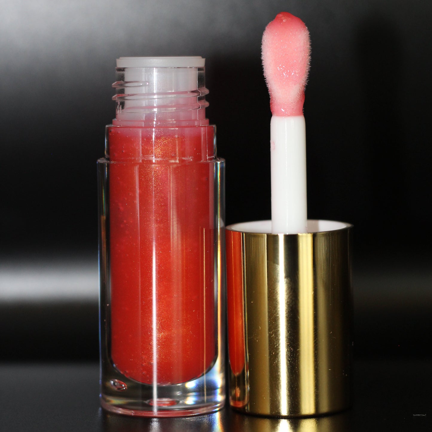 Sheil’s Hibiscus Lip Gloss
