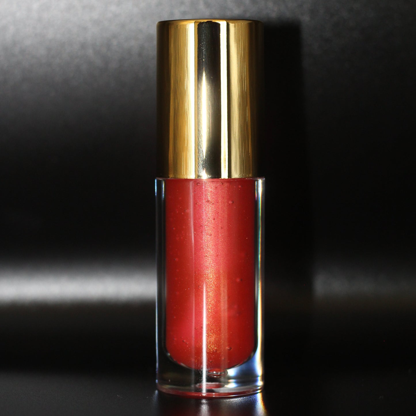 Sheil’s Hibiscus Lip Gloss